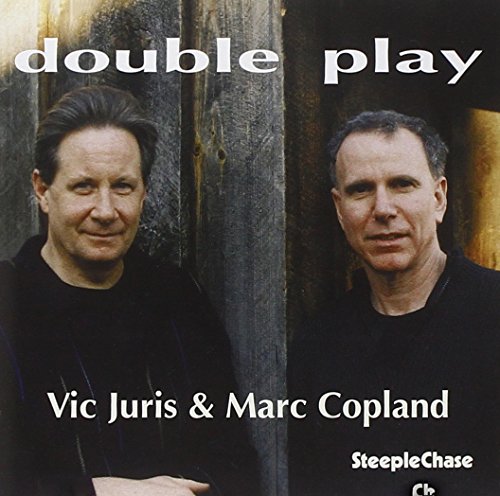 CD cover featuring portraits of two men, Vic Juris and Marc Copland.