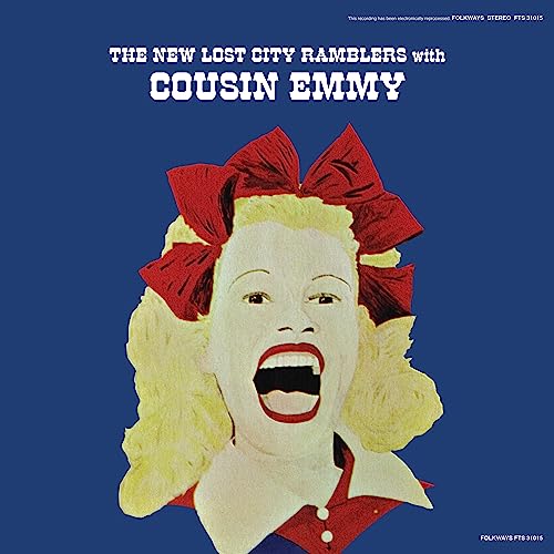 Vinyl record cover: woman with blonde curls and a large red bow.