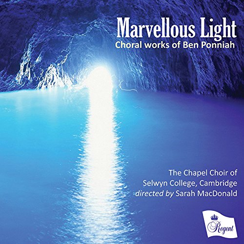 "CD cover featuring a serene, illuminated cave entrance reflected in calm blue water."