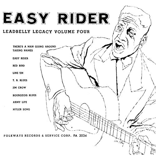 "Black and white vinyl album cover featuring a man playing guitar, titled 'Easy Rider'."