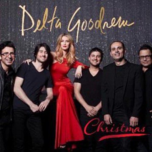 Delta Goodrem and band members on a Christmas EP cover.