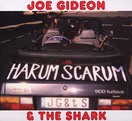 CD cover: two people in a Saab 900 turbo convertible.