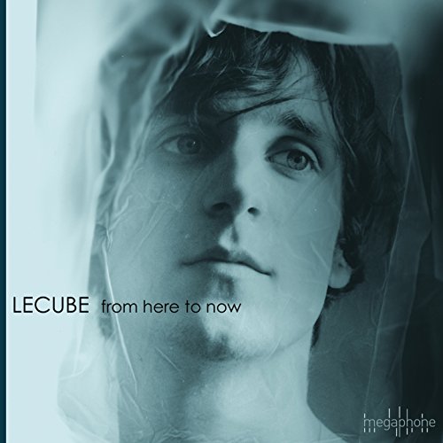 CD cover: man’s face partially obscured by translucent plastic wrap.