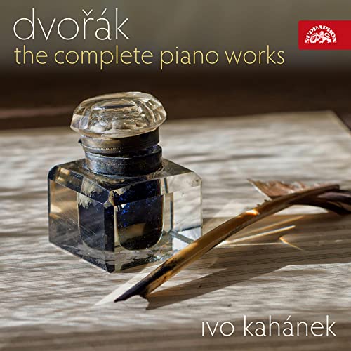 CD cover featuring a glass inkwell and a quill pen on a wooden surface.