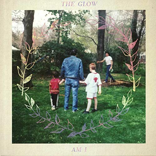 Album cover: man and two children walking in a park, surrounded by a floral frame.
