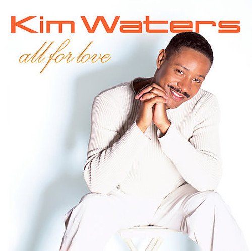 "Kim Waters album cover featuring a man in white, smiling, against a white background."