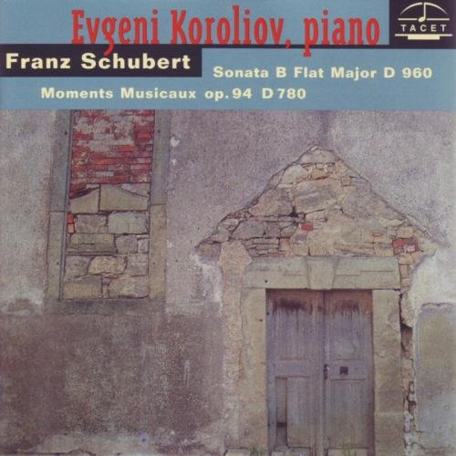 CD cover with blue top and stone wall image, featuring red and white text.