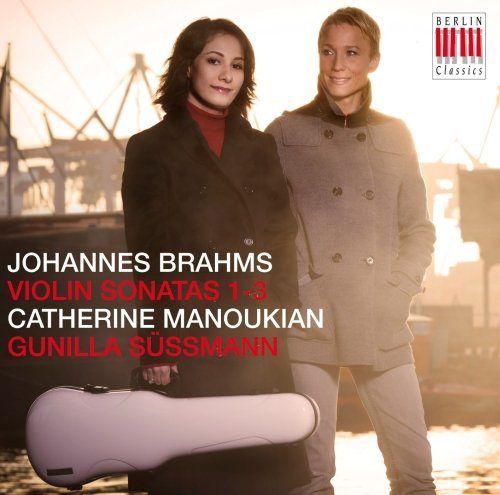 CD case cover with two women standing by water, holding a violin case.