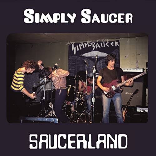 Band performing on stage, album cover for Simply Saucer’s “Saucerland” vinyl.