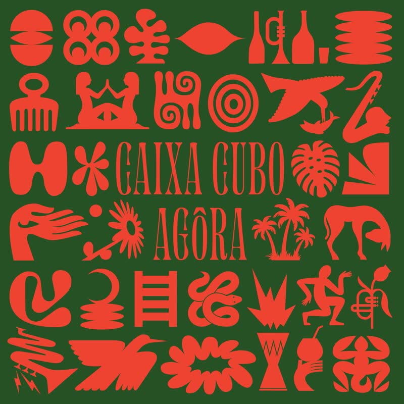 Red abstract symbols and text on a dark green vinyl record cover.