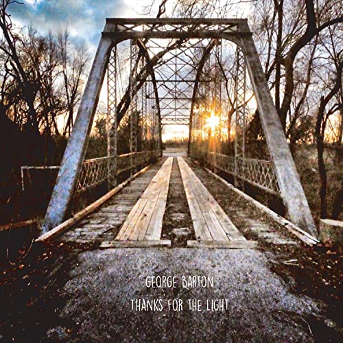 CD cover: old metal bridge silhouetted against a sunset.
