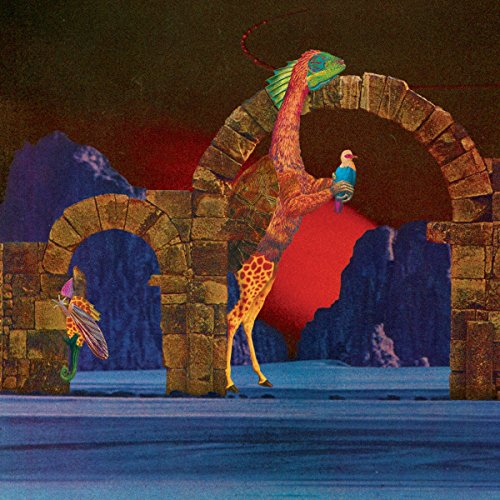 Album cover: giraffe and bird figures within stone archways, mountains.