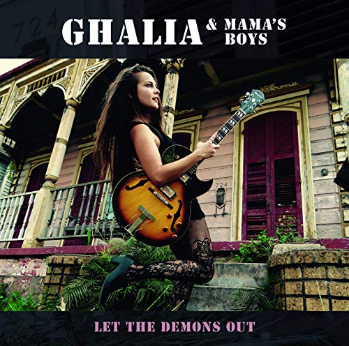 CD cover: woman with guitar kneeling on steps in front of a house.