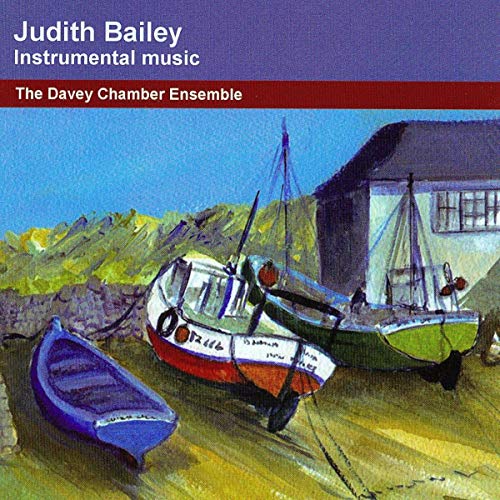 CD cover: boats on a shore with hills and a building.
