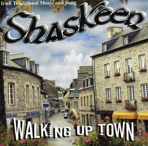 "Album cover with a quaint Irish street scene and 'Shaskeen' and 'Walking Up Town' text."