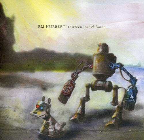 "Album cover featuring a large robot and a small robot in a misty landscape."