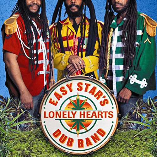 "Album cover featuring three men with dreadlocks and a circular logo with text."