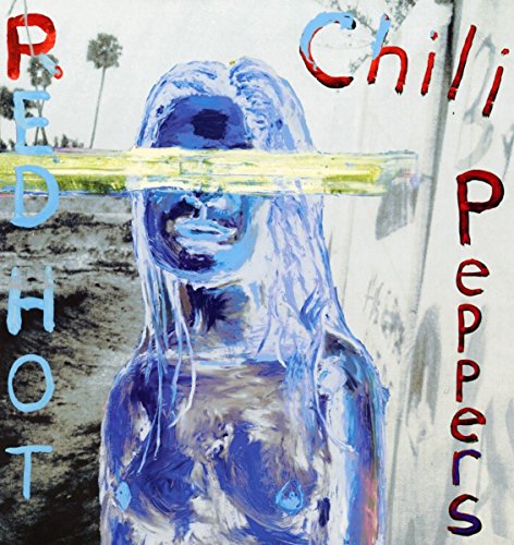 Vinyl album cover featuring a blue-toned image of a woman with obscured face.