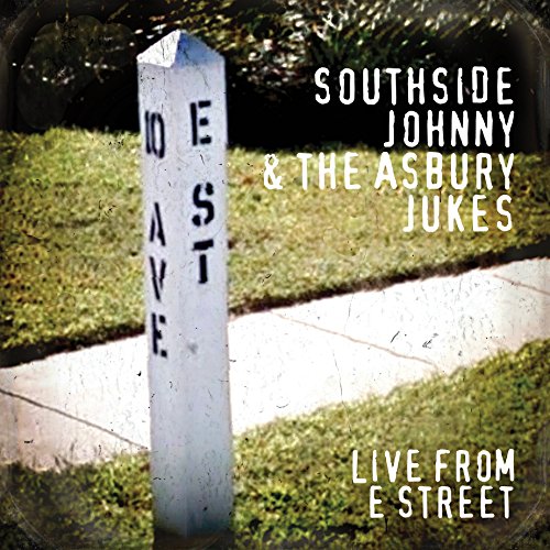 "Album cover featuring a white post with 'E STREET' text on a lawn."