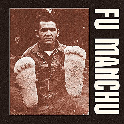 Sepia-toned album cover featuring a man with oversized hands.