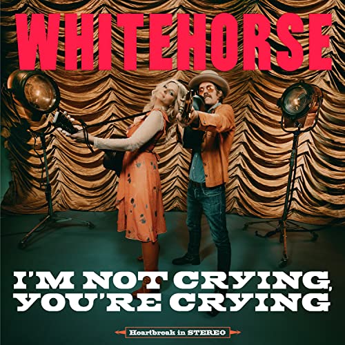Album cover for Whitehorse’s “I’m Not Crying, You’re Crying” with two musicians.