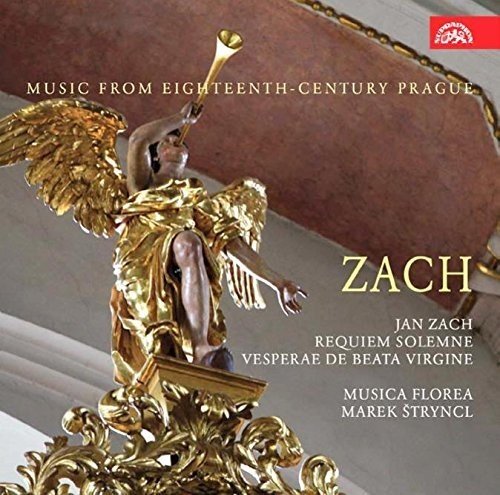 A CD cover featuring a golden angel statue with text and a red logo.