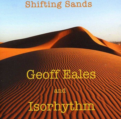 "Album cover featuring a desert landscape with sand dunes and clear blue sky."