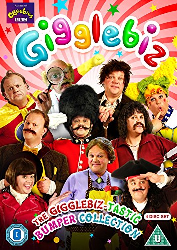 "DVD cover featuring a group of comedians in various costumes against a pink background."