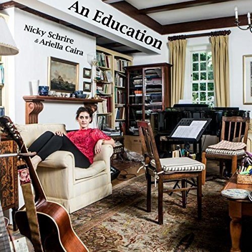 "Album cover with a woman lounging on a couch in a cozy living room."