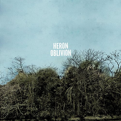 "Album cover with 'HERON OBLIVION' text, trees, and blue sky, with Amazon logo overlay."