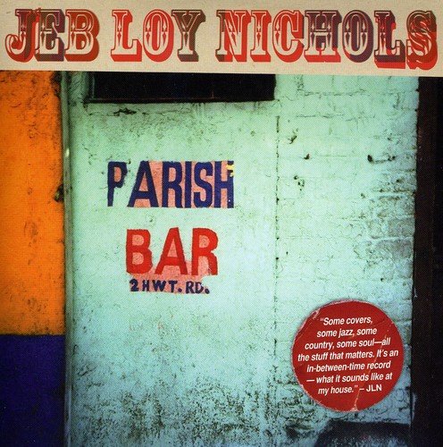 "Album cover with 'Parish Bar' on a worn, green brick wall and artist's name."