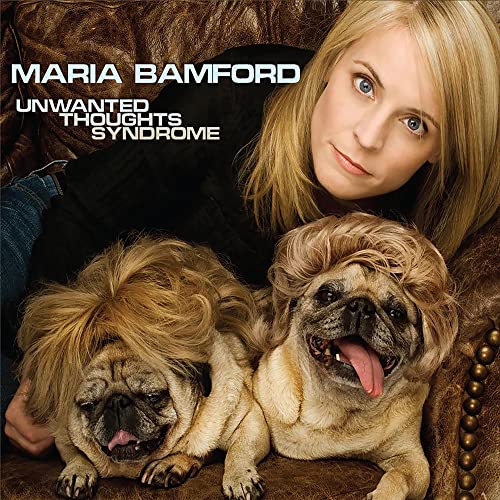 Maria Bamford album cover with comedian and two pugs, brown background.