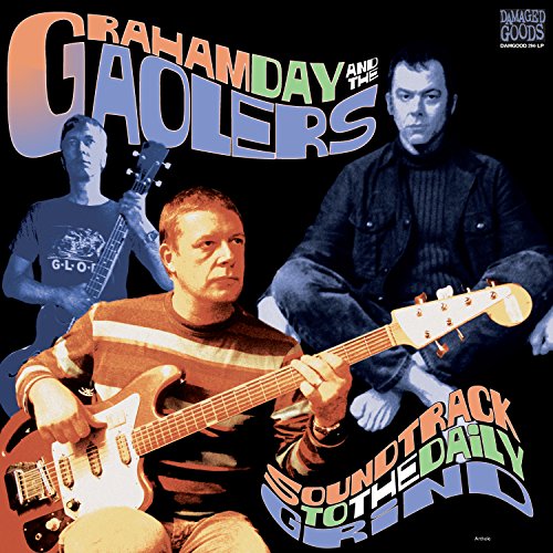 Vinyl album cover featuring three musicians with guitars, bold text design.