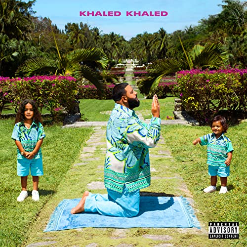 Dj Khaled album cover: kneeling man with two children in a garden.