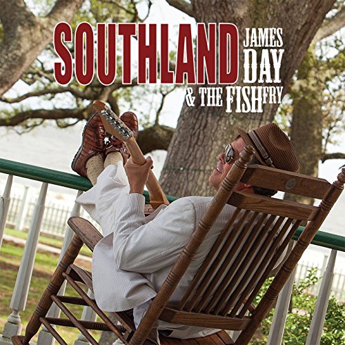 Album cover: man relaxing in a chair, holding a guitar, outdoors.