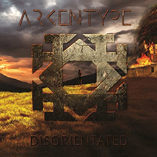 A vinyl album cover with a person standing in a field with burning ruins.
