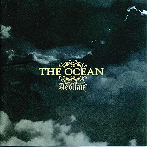 The image is a CD cover with a dark, cloudy background and yellow text. Alt text: Dark cloudy CD cover with "The Ocean Aeolian" in yellow text.