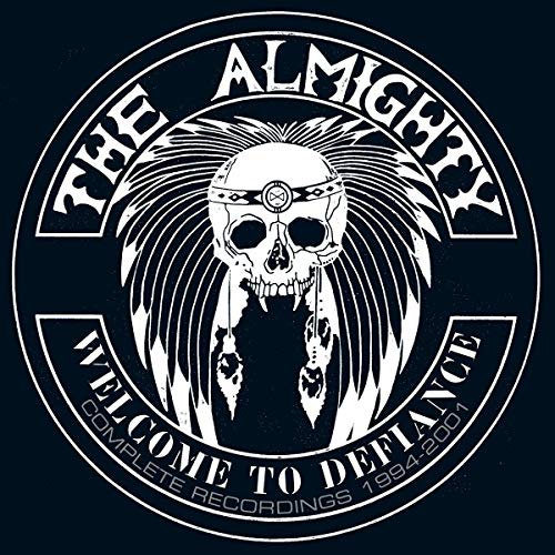 A black album cover featuring a white skull with a headband and feathers.
