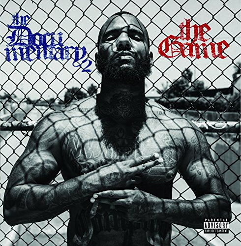 The Game album cover, black and white, with chain-link fence background.
