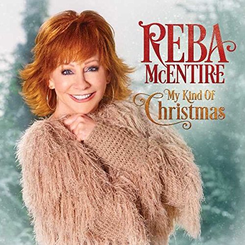 Reba McEntire's album cover: smiling woman in fuzzy sweater, snowy background, title text.