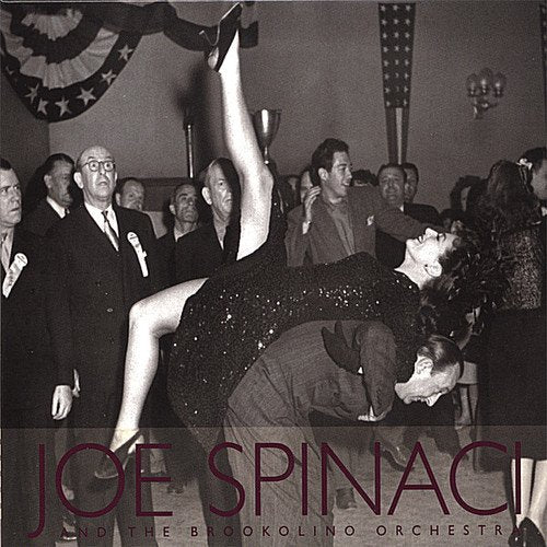 "Album cover with black-and-white image of woman being lifted by a man."