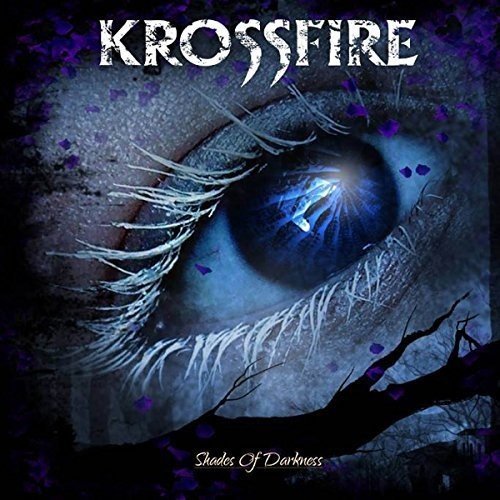 CD cover for Krossfire’s “Shades Of Darkness” featuring a close-up of a blue eye.