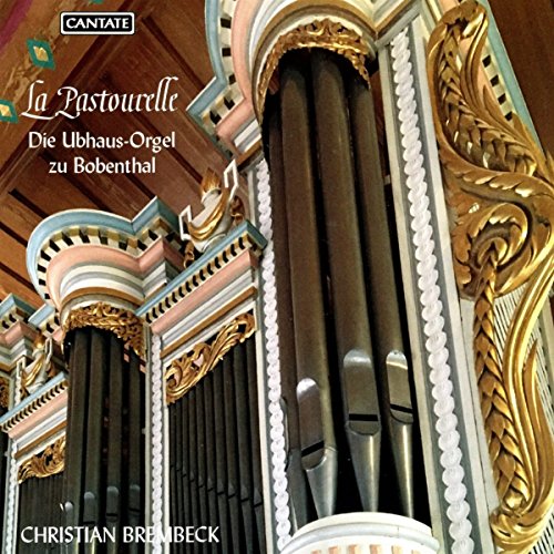 An ornate pipe organ with gold accents on a CD cover.
