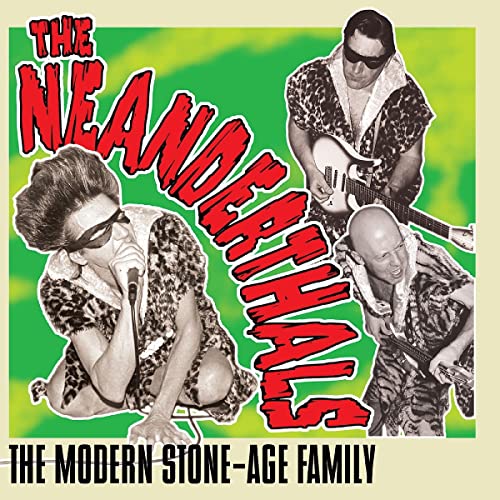 Album cover featuring three people in animal print, playing instruments.