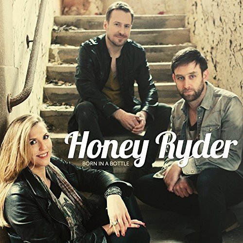 Album cover: three people, two men and a woman, sitting on stone stairs together.