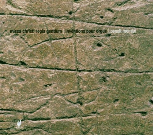 The image depicts a CD cover featuring a cracked, reddish-brown stone surface.