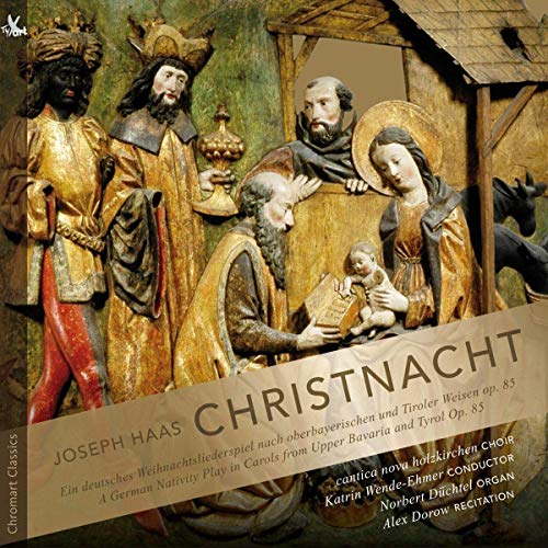 "CD cover featuring a nativity scene with ornate figures and a banner with title."