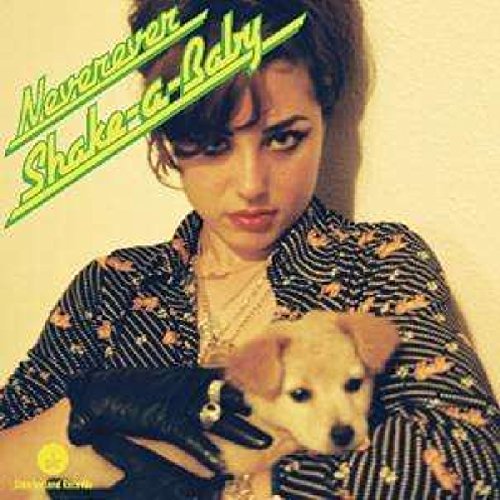 CD cover featuring a woman holding a puppy, with bold green text.