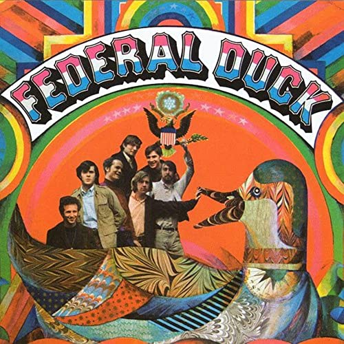 Psychedelic album cover featuring a band, an eagle, and a duck-like creature.