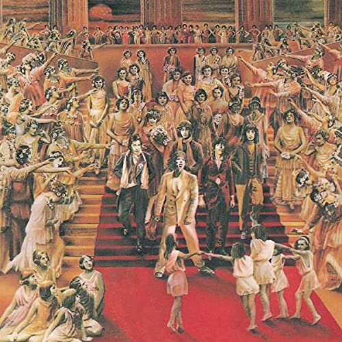 The Rolling Stones walking down red carpeted stairs surrounded by many women in dresses.